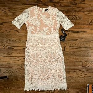 New with tags. Lulus Kayleigh white and nude lace short sleeve midi dress.